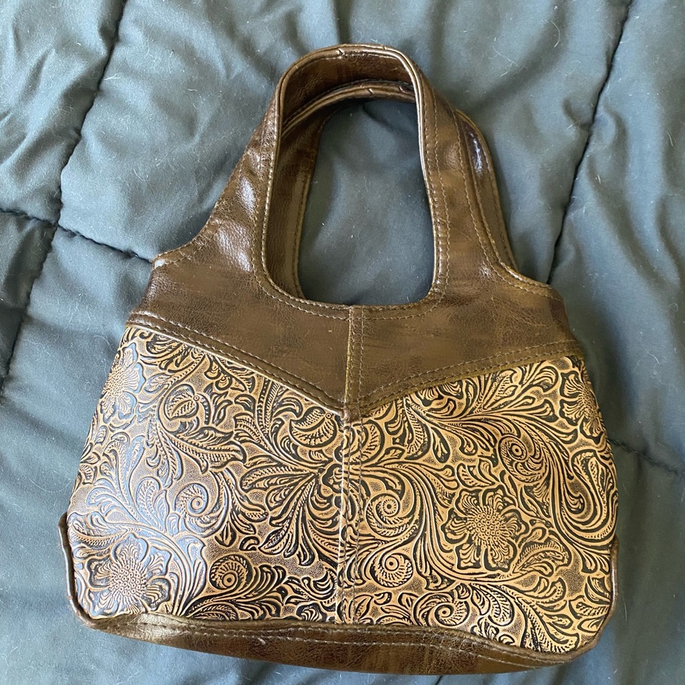 Levi’s small floral purse, boho western style Lightly worn, no noticeable flaws